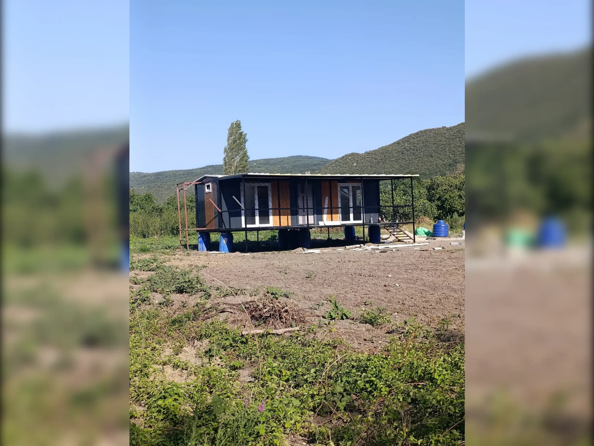 konteyner ev dış görünüm geniş veranda alanı